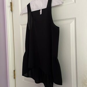 M black exhilaration top with ruffle in back